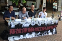 资料照：香港团体在中大举行声援中国维权律师讲座（左起：蔡耀昌、林和立、张耀良、王澄烽)