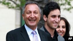 FILE - MGA chief executive Isaac Larian, left, leaves federal court in Santa Ana, Calif., April 21, 2011, after a victory over Mattel Inc. The CEO of the maker of the pouty Bratz dolls is launching a campaign to salvage some of Toys R Us' U.S. businesses being liquidated in bankruptcy.