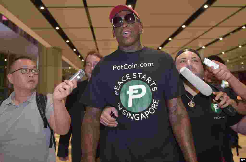 Retired American professional basketball player Dennis Rodman speaks to the press as he arrives at Changi International airport ahead of U.S.-North Korea summit in Singapore. North Korea&#39;s Kim Jong Un and U.S. President Donald Trump meet on June 12 for an unprecedented summit in an attempt to address the last festering legacy of the Cold War, with the U.S. President calling it a &quot;one time shot&quot; at peace.