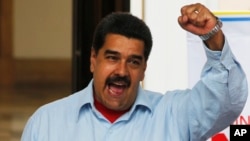 Venezuela's President Nicolas Maduro speaks during a rally at Miraflores Presidential Palace in Caracas, April 7, 2016.