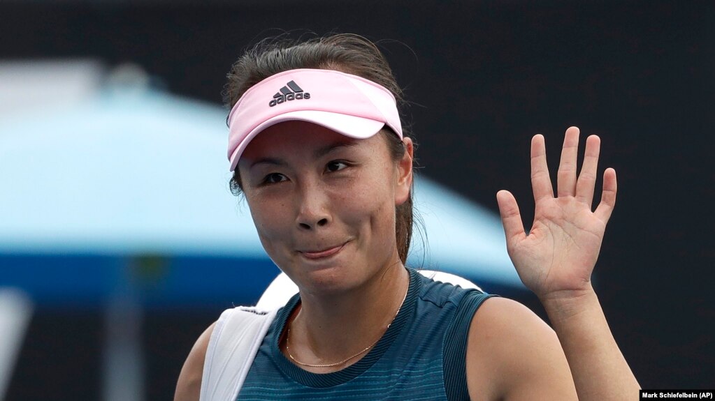 FILE - China's Peng Shuai waves after losing to Canada Eugenie Bouchard in their first round match at the Australian Open tennis championships in Melbourne, Australia on Jan. 15, 2019.