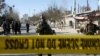 Afghan security forces keep watch at the site of a suicide attack in Kabul, Afghanistan, Dec. 28, 2017. Journalists for Afghan Voice were wounded in the attack. 