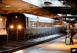 A temporary fence is erected between tracks at the train station to prevent illegal migrants entering Sweden, at Copenhagen International Airport in Kastrup on December 23, 2015.