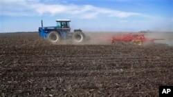 Central Illinois corn and soybean farmer cultivates field in preparation for spring planting, Waverly, Ill., April 4, 2013.