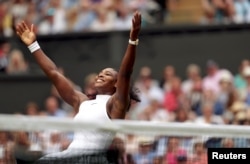 Serena Williams of the United States celebrates winning her womens singles final match against Germany's Angelique Kerber at Wimbledon, July 9, 2016.