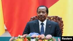 FILE - President of Cameroon Paul Biya attends a signing ceremony with Chinese President Xi Jinping (not pictured) at The Great Hall Of The People in Beijing, China, March 22, 2018.