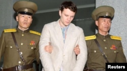  FILE - Otto Frederick Warmbier, a University of Virginia student, has been detained in North Korea since early January, is taken to North Korea's top court in Pyongyang, North Korea, March 16, 2016.