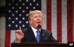 FILE - President Donald Trump delivers his first State of the Union address in the House chamber of the U.S. Capitol to a joint session of Congress, Jan. 30, 2018.