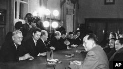 FILE - President Mao Tse-tung, right, of the Communist Chinese republic and Soviet Prime Minister Nikolai Bulganin, left, of the Soviet Union chat together in Moscow, Nov. 4, 1957.