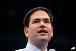 FILE - then-Republican presidential candidate Sen. Marco Rubio, R-Fla., speaks during a campaign rally at Palm Beach Atlantic University in West Palm Beach, Fla.