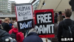 FILE - Protesters demand freedom for journalist Dawit Isaak, who is being held in a prison in Eritrea, at a 2015 rally. 