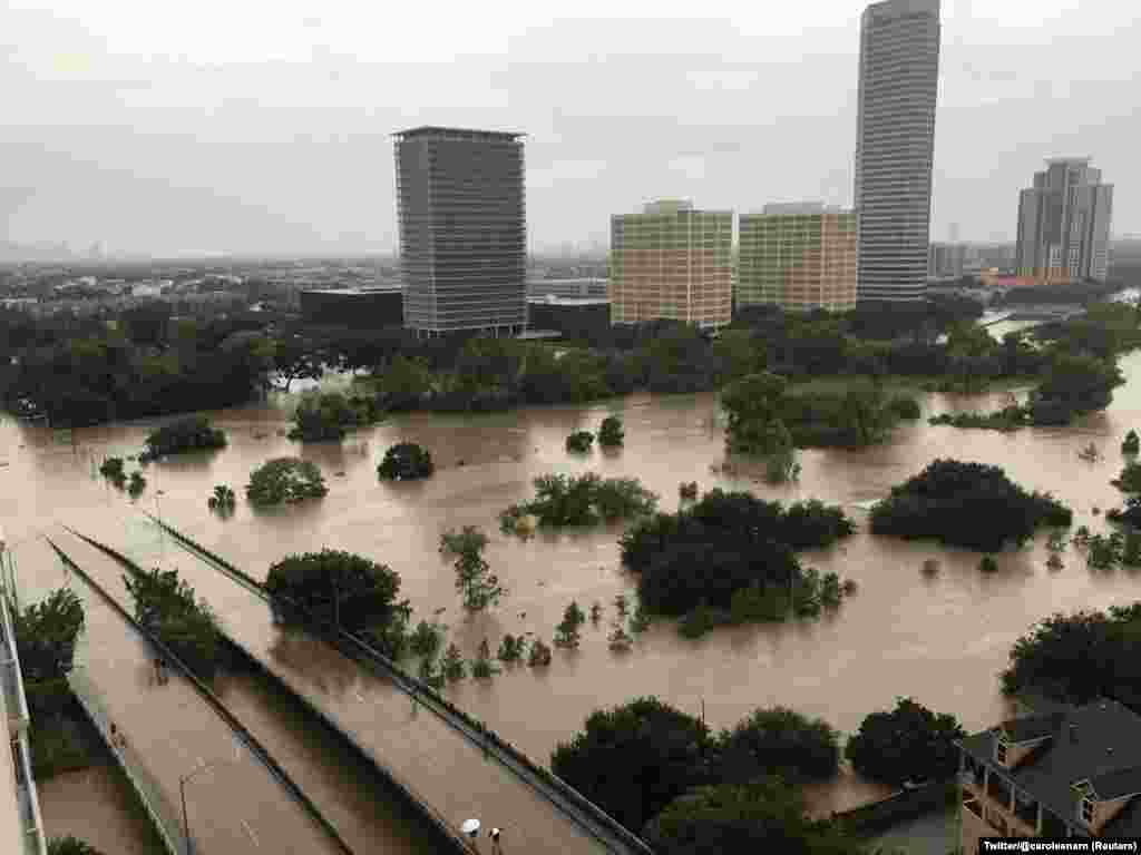 Flooded downtown is seen from a high rise along Buffalo Bayou after Hurricane Harvey inundated the Texas Gulf coast with rain causing widespread flooding, in Houston, Texas, Aug. 27, 2017, in this picture obtained from social media. 