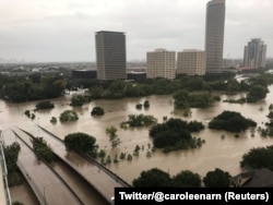 Flooded downtown is seen from a high rise along Buffalo Bayou after Hurricane Harvey inundated the Texas Gulf coast with rain causing widespread flooding, in Houston, Texas, Aug. 27, 2017, in this picture obtained from social media.