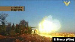 Hizbullah'a ait el Manar televizyonu, Suriye ordusunun Zabadani'ye düzenlediği saldırıyla ilgili görüntülere yer veriyor.