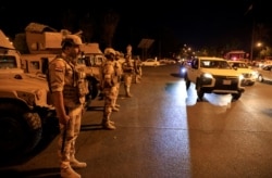 Iraqi soldiers take part in an intensive security deployment following a drone attack on Prime Minister Mustafa al-Kadhimi's residence in Baghdad, Nov. 7, 2021.