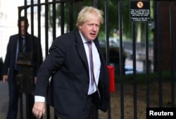 Britain's Secretary of State for Foreign and Commonwealth Affairs Boris Johnson arrives at 10 Downing Street in London, July 3, 2018.