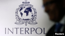 FILE - Greek police said on March 30, 2024, that they had arrested a member of a gang wanted by Interpol for smuggling Latin American fuel products for illegal sale around the world.