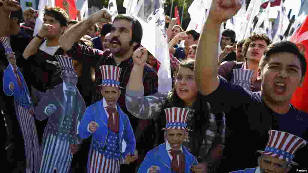 Members of the nationalist Youth Union of Turkey demonstrate during the Group of 20 (G20) leaders summit in the Mediterranean resort city of Antalya, Turkey, November 15, 2015.