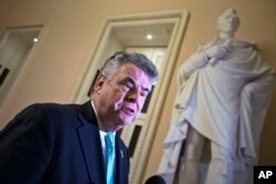 FILE - Rep. Peter King (R- NY) speaks to reporters on Capitol Hill.