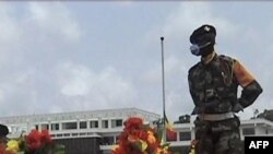 Учасник похорону в Браззавілі