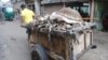 A worker pulls a cart of animal hides. Human Rights Watch has warned of toxic conditions for workers and Hazaribagh's residents. (A. Yee/VOA)