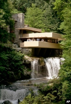 Fallingwater, one of the late architect Frank Lloyd Wright's best-known works, hangs over Bear Run waterfall in Big Run, Pa., Aug. 23, 2007.