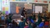 At a primary school in Johannesburg, South Africa, teachers are guided by mentors to support them in implementing new teaching methods. (E-Jansson/UNESCO)