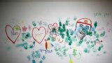 A wall decorated with paintings by children are seen in a bomb shelter in the Israeli southern city of Ashkelon, July 31, 2014. The words in Hebrew read, &quot;Protective Edge.&quot;