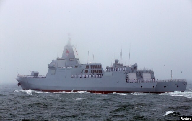 FILE - The Chinese navy's 055-class guided missile destroyer Nanchang takes part in a naval parade off the eastern port city of Qingdao, April 23, 2019.