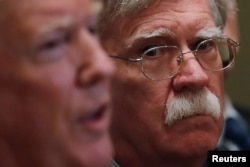 White House national security adviser John Bolton participates in a briefing from senior military leaders for President Donald Trump in the Cabinet Room of the White House in Washington, April 9, 2018.