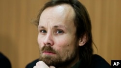 FILE - German freelance reporter Billy Six attends a news conference in Berlin, March 6, 2013. The freelance journalist had been released from 12-weeks captivity in Syria and said he was not mistreated by his captors.