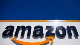 In this April 16, 2020, file photo, the Amazon logo is shown in Douai, northern France. The deal, proposed by President Biden, aims to collect taxes from international companies like Amazon that use online business to avoid taxes since they may not have an actual physical presence. Large international companies like Amazon also move profits to tax havens. (AP Photo/Michel Spingler, File)