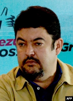FILE - Roberto Marrero gives a press conference in Caracas, Dec. 8, 2015.
