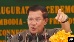 Cambodia's Prime Minister Hun Sen gestures as he delivers a speech during his presiding over an inauguration ceremony, Phnom Penh, Cambodia. 