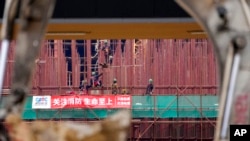 Vietnamese workers at construction site of first Chinese car tire factory in Europe near northern Serbian town of Zrenjanin, 50 kilometers north of Belgrade, Nov. 18, 2021.