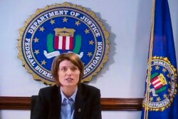 Executive Assistant Director for National Security Branch of the FBI Jill Sanborn, seen from a video monitor, testifies remotely before the Senate Judiciary Committee virtual hearing on the domestic terrorism threat, Jan. 11, 2022, in Washington.
