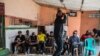 Rap music artists gather for a meeting to discuss how to get involved in politics in Kinshasa, Democratic Republic of Congo. 