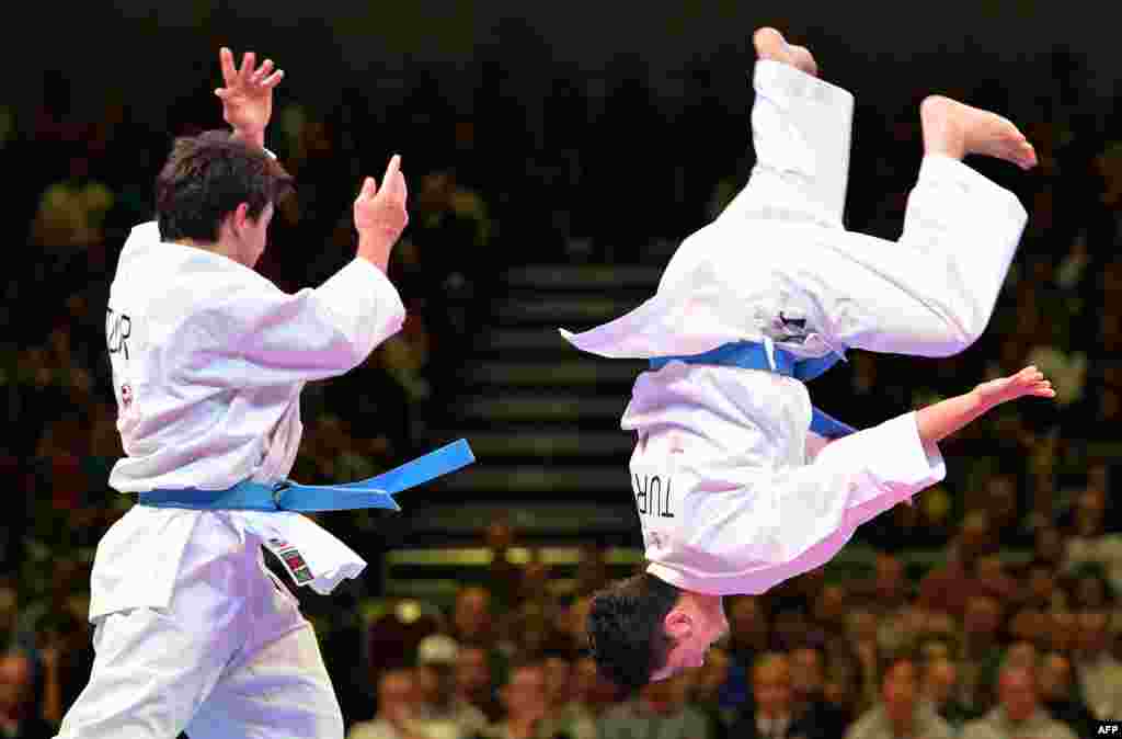 Turkey&#39;s team competes in the third-place fight at the Men&#39;s Kata Team competition at the 22nd Karate World Championships in Bremen, Germany. 