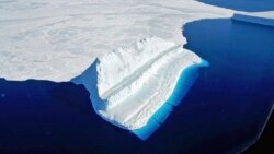 The frigid Antarctic region is an expanse of white ice and blue waters, as pictured in March, 2017, at the U.S. research facility McMurdo Station. (Chris Larsen/NASA via AP)