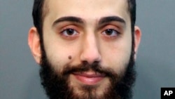 FILE - This April 2015 booking photo released by the Hamilton County, Tennessee, sheriff's office shows a man identified as Muhammad Youssef Abdulazeez.