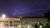 FILE - Lightning is seen over the U.S. Embassy in Berlin, Germany, Aug. 9, 2018. 