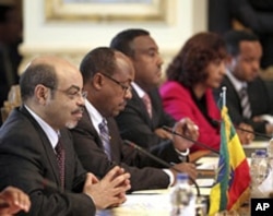 Ethiopian Prime Minister Meles Zenawi, first from left, and his delegation attend a meeting with Egyptian Prime Minister Essam Sharaf, not pictured, in Cairo, Egypt, September 17, 2011 to discuss Ethiopia's planned Nile River dams.