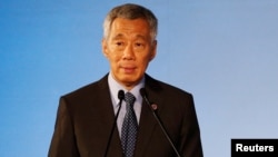 Singapore’s Prime Minister Lee Hsien Loong gives an address during the opening ceremony of the 51st ASEAN Foreign Ministers' Meeting in Singapore, Aug. 2, 2018.