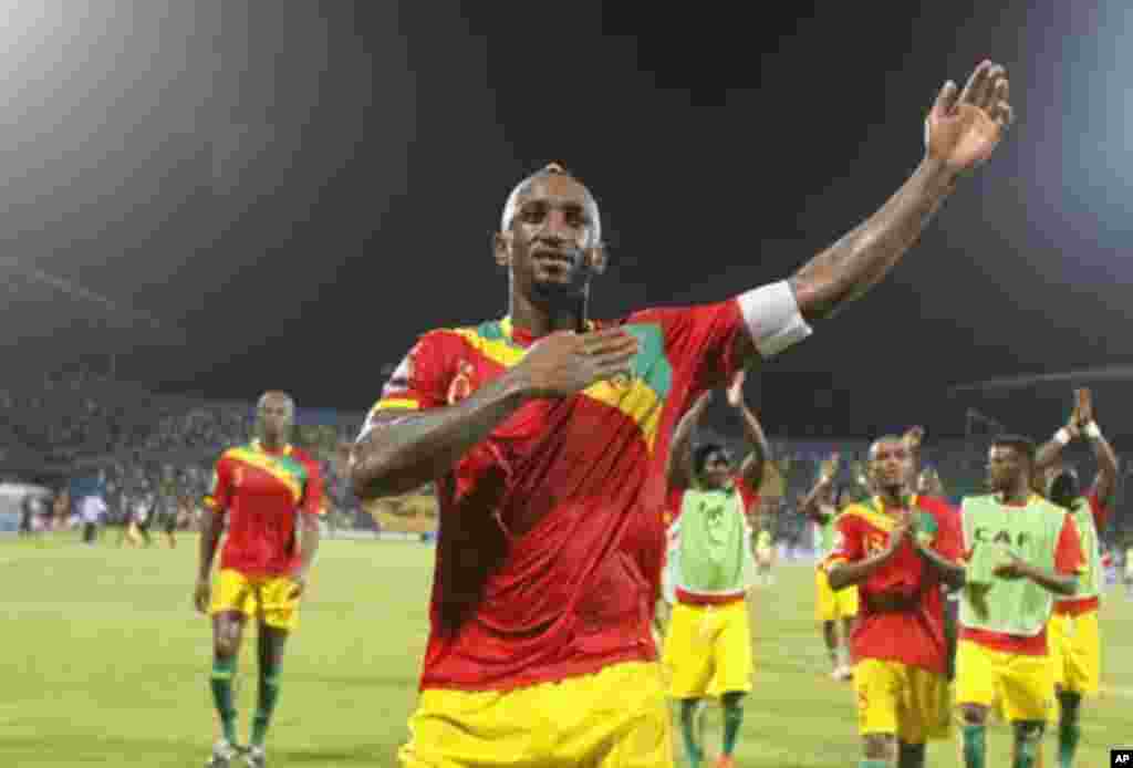 Guinea's Kamil Zayatte (front) celebrates after winning their African Nations Cup Group D soccer match against Botswana at Franceville Stadium January 28, 2012. Guinea won 6-1.