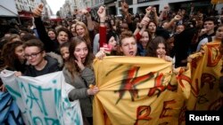 French high school students attend a demonstration in Paris, Oct. 17, 2013, to protest the expulsion of Kosovar schoolgirl Leonarda Dibrani and another deported student of Armenian descent, Khatchik Kachatryan.