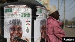 Affiche de campagne d'Atiku Abubakar, chef du Parti démocratique populaire (PDP), à Kano, au Nigéria, le 17 février 2019. REUTERS / Luc Gnago / 
