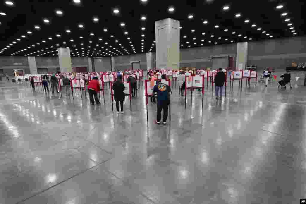 Voters cast their ballots at the Kentucky Exposition Center in Louisville, Kentucky.