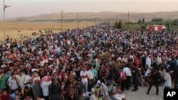 Penaberên Kurdên Sûrîyê li nêzîkî Pêşxabur, sînorê Herêma Kurdistanê.