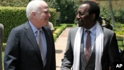 U.S. Senator John McCain, left, meets with Mali's interim President Dioncounda Traore, in Bamako, Mali Tuesday, Apr. 2, 2013.