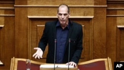 Greek Finance Minister Yanis Varoufakis speaks during a Parliament session in Athens, Feb. 9, 2015. 